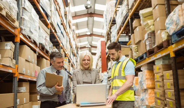 Warehouse team working together — Stock Photo, Image