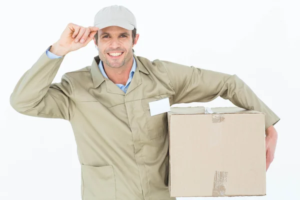 Entrega homem transportando caixa de papelão — Fotografia de Stock