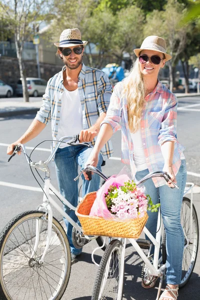 Attractive couple on a bike ride — Stock Photo, Image