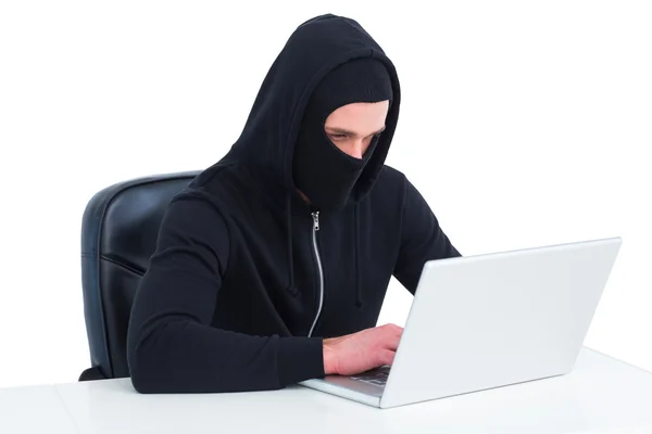 Hacker using laptop to steal identity — Stock Photo, Image