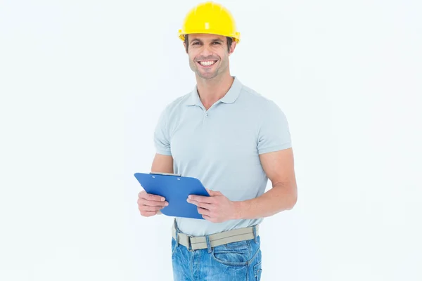 Happy architect holding clip board — Stock Photo, Image