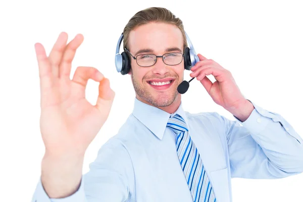 Zakenman met maken oke sign headset — Stockfoto