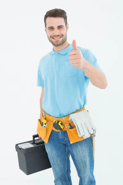 Happy carpenter gesturing thumbs up — Stock Photo, Image