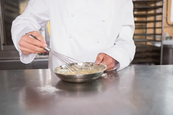 Baker preparing a pastry — Stock Photo, Image