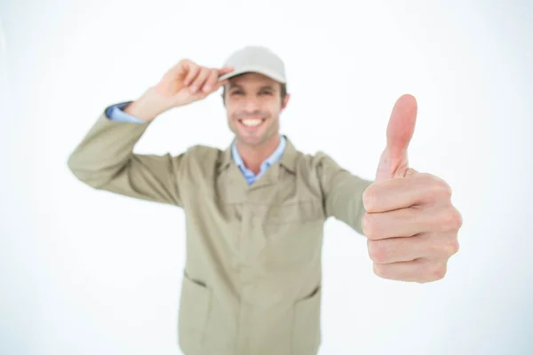 Leverans mannen gestikulerande tummen upp — Stockfoto