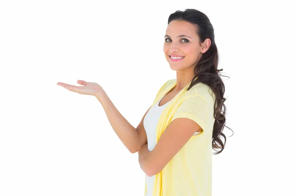 Pretty brunette smiling at camera Stock Picture