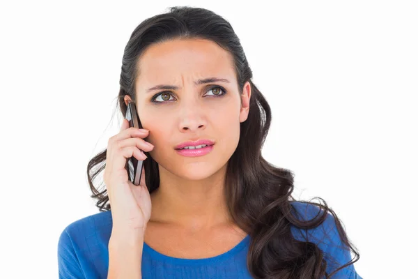 Pretty brunette talking on the phone Royalty Free Stock Photos