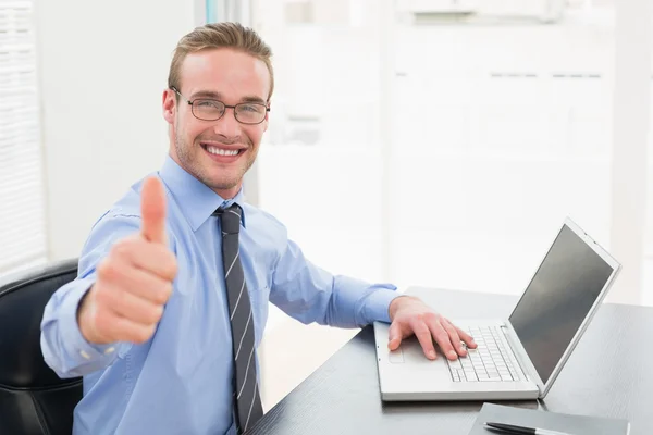 Businessman with glasses and thumb up Stock Picture