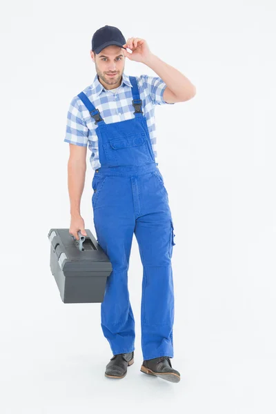 Homem confiável handyman carregando caixa de ferramentas — Fotografia de Stock