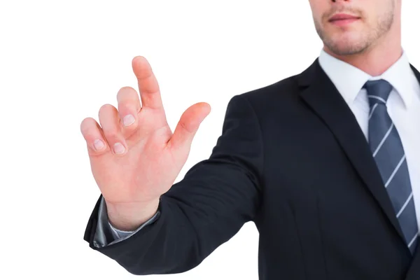 Homem de negócios focado apontando com o dedo — Fotografia de Stock