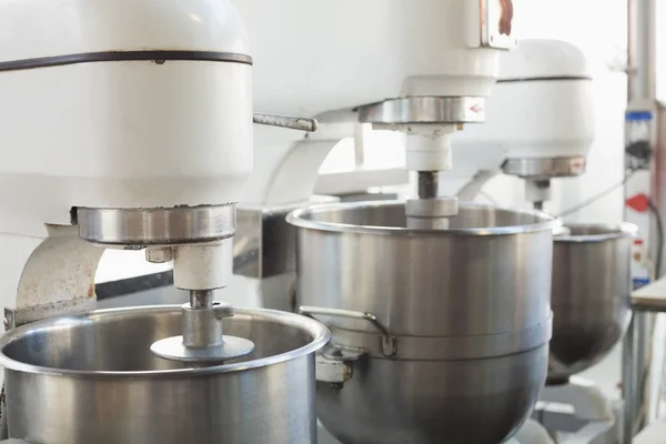 Industrial mixers on counter — Stock Photo, Image