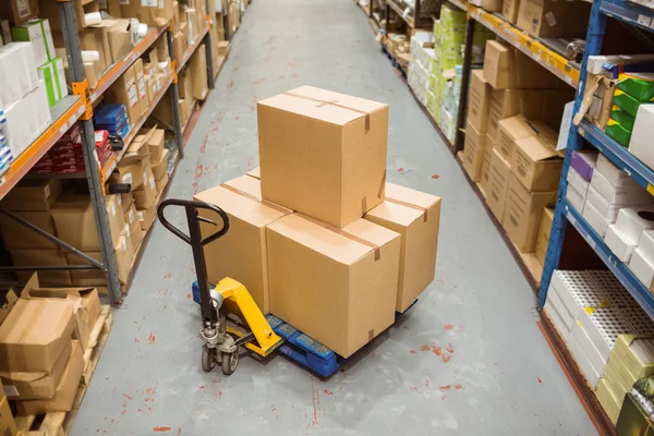 Cardboard boxes in warehouse — Stock Photo, Image