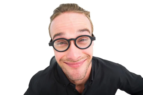 Empresario con gafas de lectura haciendo una cara — Foto de Stock