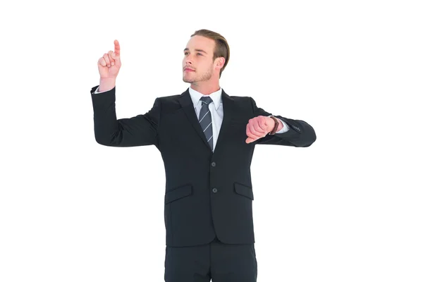 Cheerful businessman pointing up with finger — Stock Photo, Image