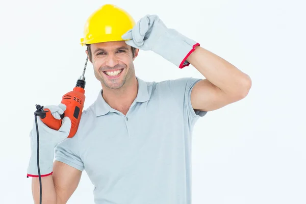 Arquitecto guapo sosteniendo la máquina de perforación — Foto de Stock