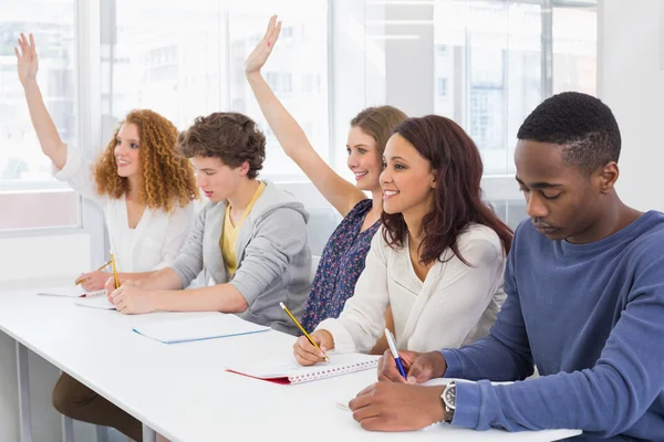 Fashion students being attentive in class — Stock Photo, Image