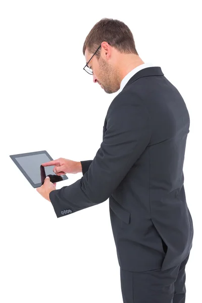 Businessman using his tablet pc — Stock Photo, Image