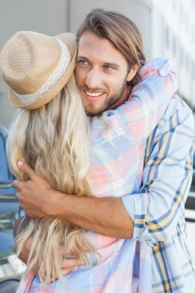 Cute couple standing and hugging — Stock Photo, Image