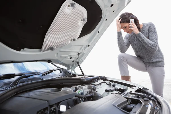 Desperate woman calling for assistance — Stock Photo, Image