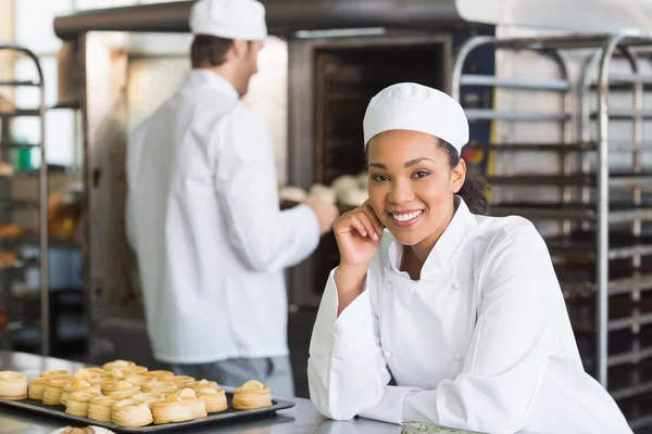 Baker smiling at the camera — Stock Photo, Image