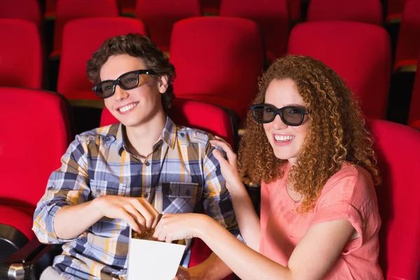 Young couple watching a 3d film — Stock Photo, Image