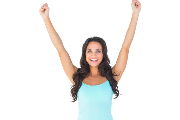 Casual brunette cheering at camera — Stock Photo, Image