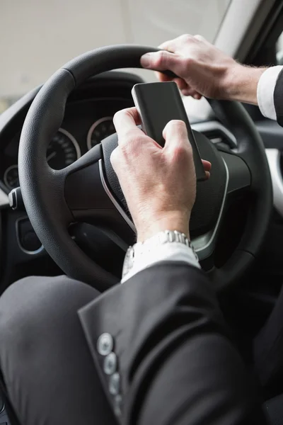 Close up of businessman sending a text message — Stock Photo, Image