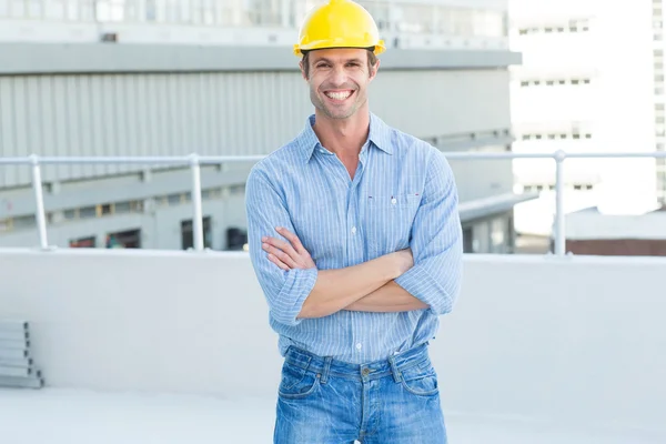 Happy architect standing arms crossed — Stock Photo, Image