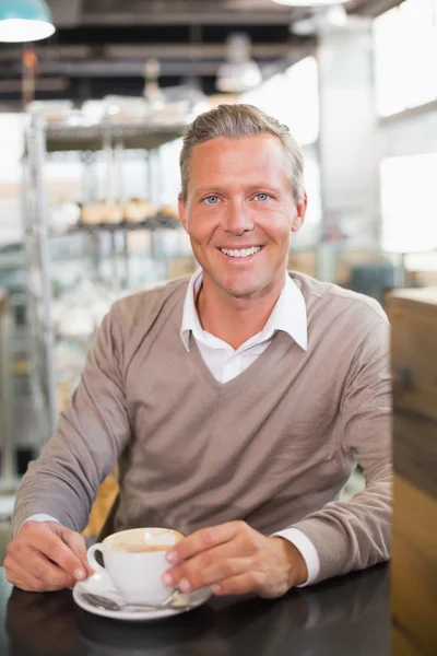 Handsome man having a coffee — Stock Photo, Image