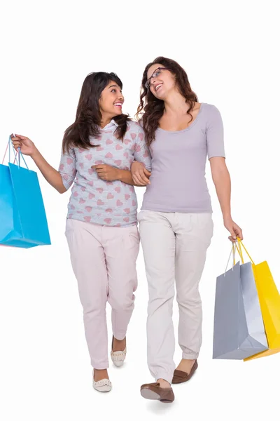 Friends walking with shopping bags — Stock Photo, Image