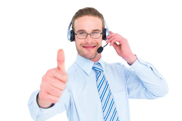 Hombre de negocios positivo con auriculares pulgar hacia arriba —  Fotos de Stock