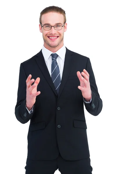 Happy businessman gesturing with his hands — Stock Photo, Image