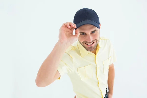 Delivery man wearing baseball cap — Stock Photo, Image