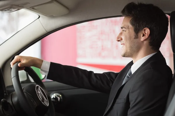 Uomo d'affari al volante in vendita — Foto Stock