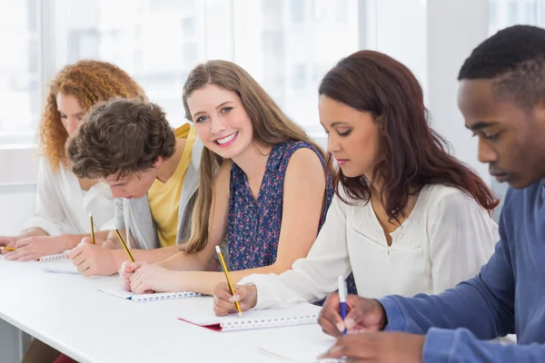 Fashion students being attentive in class — Stock Photo, Image