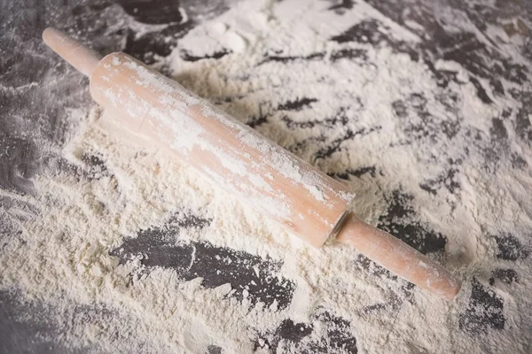 Rolling pin in flour — Stock Photo, Image