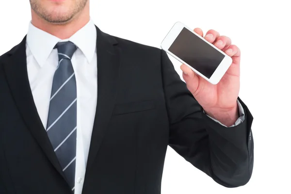 Бизнесмен показывает экран своего смартфона — стоковое фото