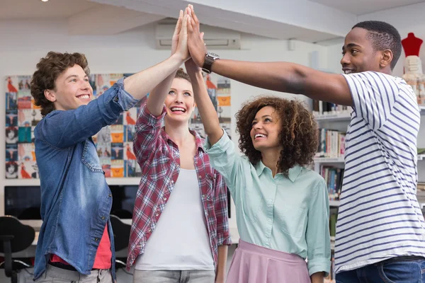 Fashion students high fiving together — Stock Photo, Image