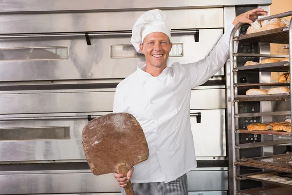 Happy baker smiling at camera — Stock Photo, Image