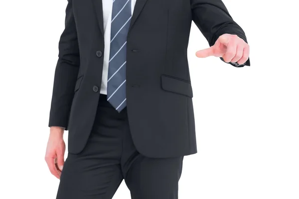 Mid section businessman pointing with his finger — Stock Photo, Image