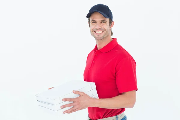 Uomo di consegna che tiene scatole di pizza — Foto Stock