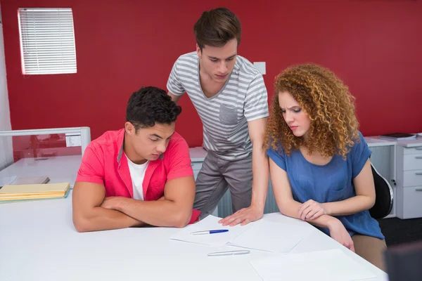 Serious students working together — Stock Photo, Image