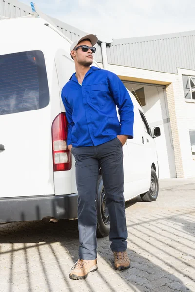 Handsome handyman posing with sunglasses — Stock Photo, Image