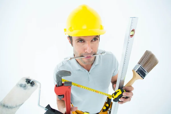 Carpenter with various equipment — Stock Photo, Image