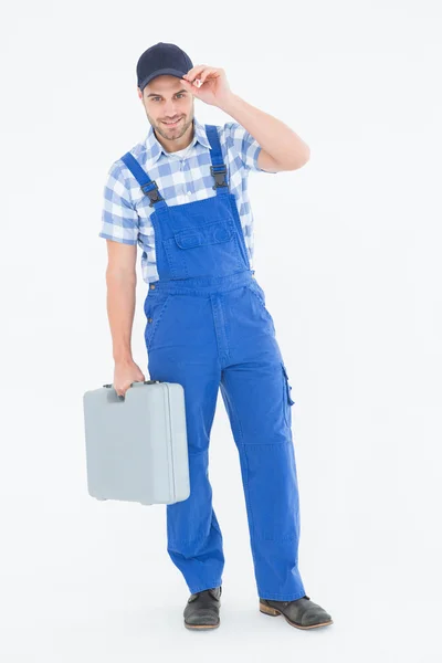 Reparador masculino confiante carregando caixa de ferramentas — Fotografia de Stock