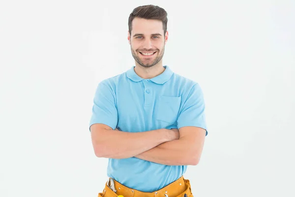 Happy carpenter standing arms crossed — Stock Photo, Image