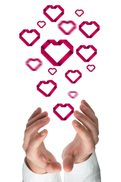 Hands holding hearts — Stock Photo, Image