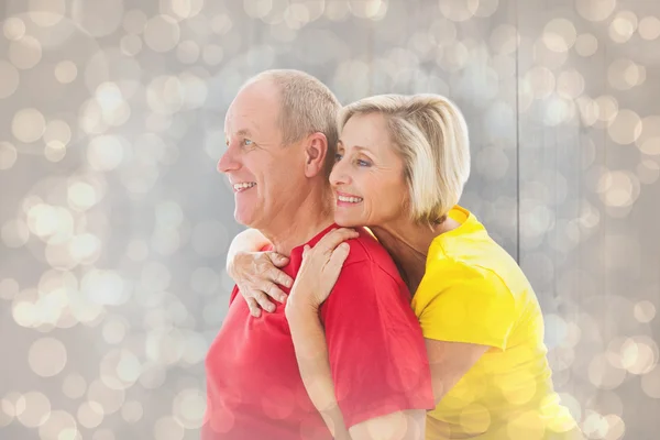 Happy mature couple hugging and smiling — Stock Photo, Image