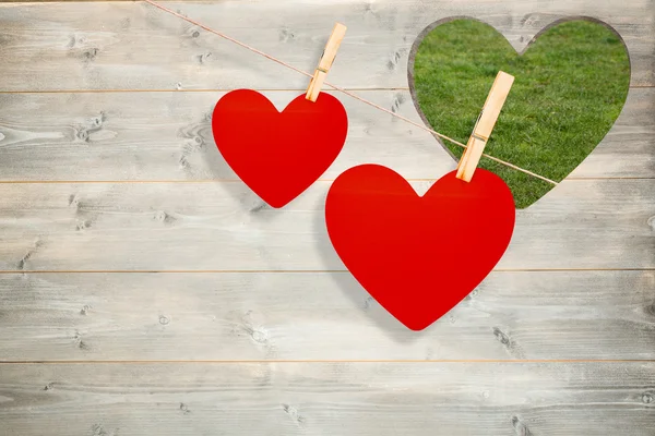 Hearts hanging on a line — Stock Photo, Image