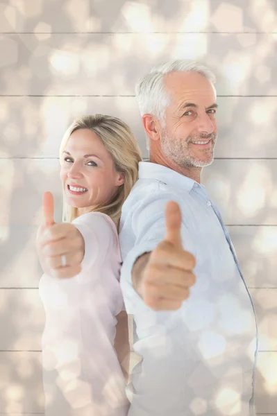Couple showing thumbs up together — Stock Photo, Image